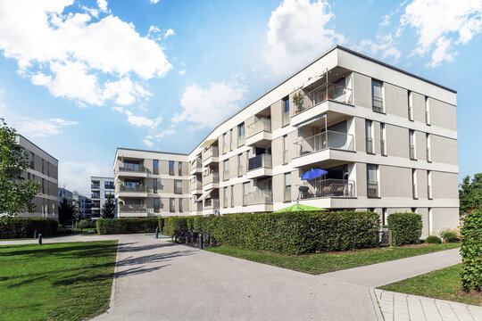 Residential area with ecological and sustainable green residential buildings, low-energy houses with modern apartments, new green urban landscape in the city