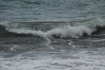 wave breaking on the beach