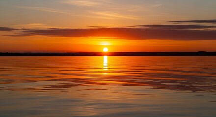 Obraz premium Sunset Over Calm Water.