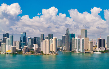 Obraz premium Aerial view of Brickell skyline in downtown Miami. Modern skyscrapers rise above Biscayne Bay. Miami Urban landscape with iconic buildings. Miami cityscape.