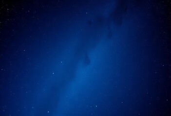 Fototapeta premium Vast, shimmering blue night sky filled with countless stars, gleam, deep