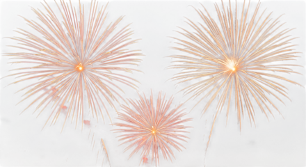 Three golden and pink fireworks exploding in a burst of light against a clean transparent background, isolated on transparent background