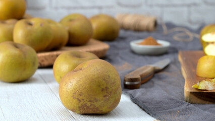 Apples on a Table with Cinnamon