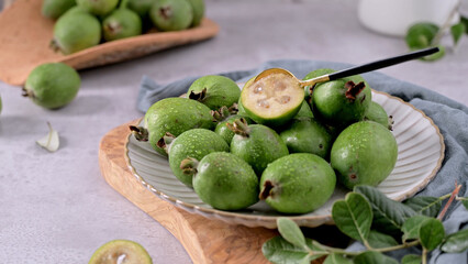 Fresh Feijoa Fruit with a Spoon on a Plate