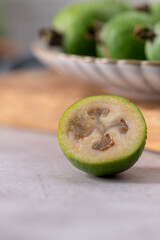 Detailed close-up of a cut feijoa fruit