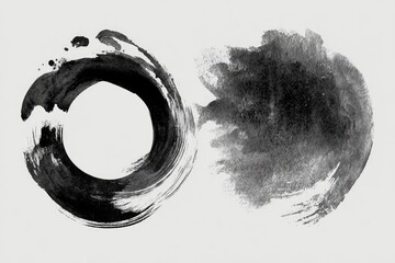 Two ink wash circles, one circular, one irregular