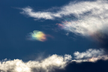 Beautiful multicolored clouds in the sky. Colorful clouds.