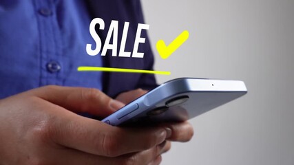 Corporate female leader using her cell phone, with an animation of the word "Sale" with a check mark and underline.