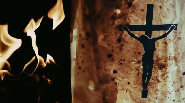 Christian Symbol Jesus Cross on an Old Ancient Parchment in Hell Fire Burning Flames