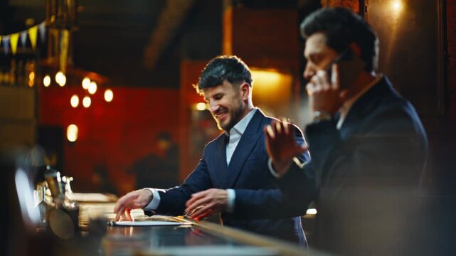 Elegant man greeting barista meeting friend evening bar closeup. Guys speaking