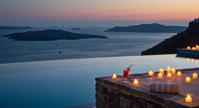 Luxury infinity pool view sunset ocean islands candles cocktail relaxing romantic vacation destination