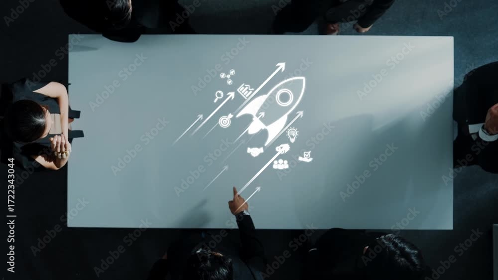 Poster a high-angle view of a business meeting featuring a table with projected rocket imagery, symbolizing