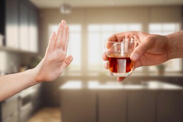 Alcoholism concept, depressed person push out alcohol