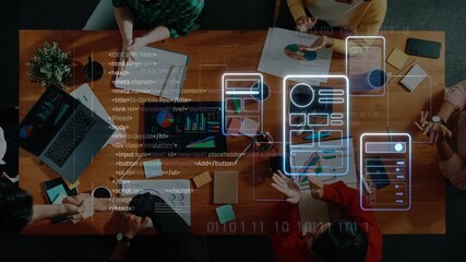 A diverse team collaborates on a software development project, reviewing code and design elements in a modern office setting, showcasing creativity and teamwork. Raster - Powered by Adobe