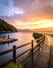 Sunrise over calm water, walkway