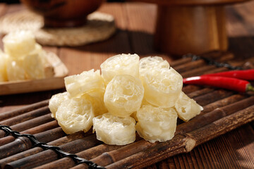 Fresh Lotus Root Rings on Bamboo Mat - Asian Vegetable Ingredient for Healthy Cooking