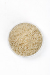 Long Grain Basmati Rice in White Bowl on White Background - Agricultural Food Product Photography