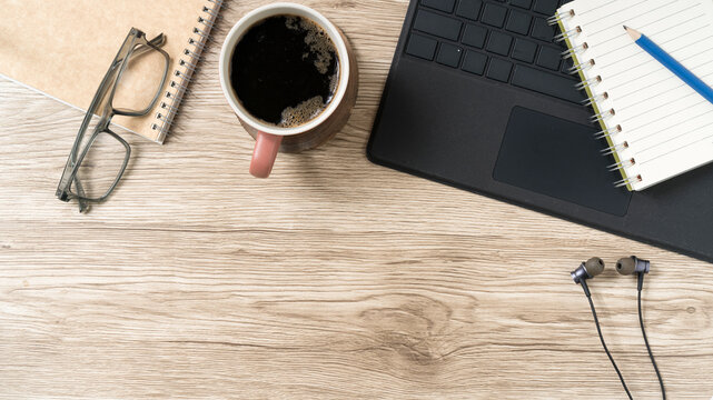 Modern work from home essentials flatlay offers a cozy, productive vibe for your next project showcasing technology, planning, and relaxation elements