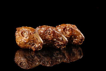 Rabbit Head Pastries with Sesame Seeds on Black Background - Traditional Chinese Bakery from Chengdu Shuangliu
