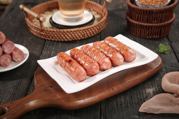 Grilled Sausages on Wooden Board with Rustic Kitchen Setting