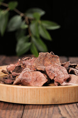 Dried Porcini Mushrooms on Wooden Plate - Gourmet Cooking Ingredients