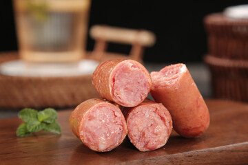 Raw Sausages on Wooden Board Ready for Grilling - Fresh Meat Preparation