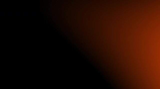 4k stock | Abstract gradient in dark black transitions into orange. Suitable for backgrounds, video transitions, or digital art projects requiring a bold color scheme.