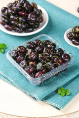 Fresh Dark Purple Cherries in Glass Bowl - Healthy Summer Fruit Display