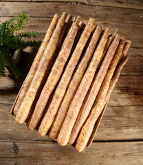 Fresh Organic Yam Roots in Wooden Crate on Rustic Farm Table - Natural Harvest Produce