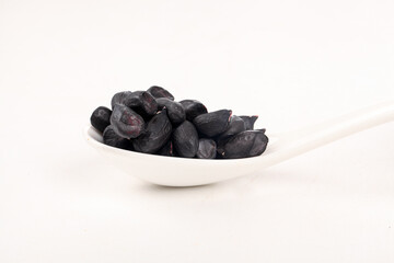 Dried Black Selenium-Enriched Peanuts from Yunnan Province in White Bowl
