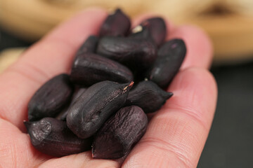 Handful of Black Selenium-Enriched Peanuts from Yunnan Province - Dried Nuts and Grains Healthy Snack Food