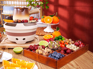 Healthy Snack Platter with Fresh Fruits Nuts and Tea Setup on Rustic Kitchen Counter