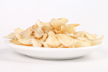Dried Garlic Slices on White Plate - Fresh Dehydrated Cooking Ingredient