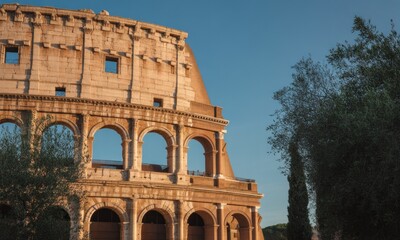 Fototapeta premium Ancient Colosseum facade at dawn