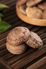 Fresh Dried Shiitake Mushrooms on Wooden Surface - Asian Cooking Ingredients