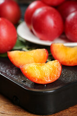 Fresh Red Plums Sliced on Slate Board - Ripe Stone Fruit Pictures