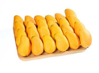 Fresh Golden Tainong Mangoes Arranged on Wooden Tray - Tropical Fruit Market Display