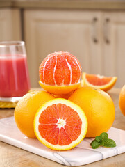 Fresh Red Chinese Oranges from Zigui Display with Juice Glass Kitchen Food Photography