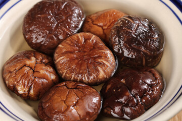 Fresh Shiitake Mushrooms Soaking in Bowl Ready for Cooking and Asian Cuisine Preparation
