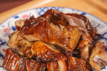 Guangxi Air-Dried Preserved Duck Hand-Torn Traditional Chinese Gourmet Food on Porcelain Plate