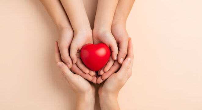 Family hands holding red heart, health care, hope, life insurance concept, world heart day, world health day, adoption foster care home, organ donor day, csr social responsibility, gratitude