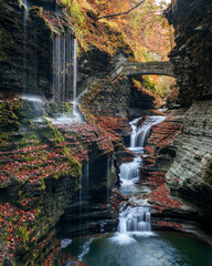 Watkins Glen Gorge with beautiful Fall colors and flowing water falls