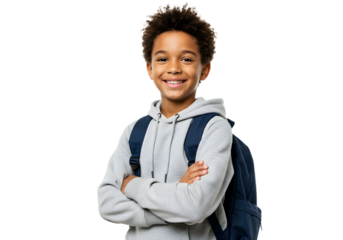 Young boy with backpack smiling confidently, ready for school adventures
