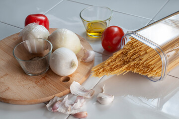 ingredients in a kitchen to prepare pasta Italian food, culinary art