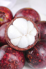 Fresh Mangosteen Fruit from Thailand with White Flesh Exposed - Exotic Tropical Asian Fruit