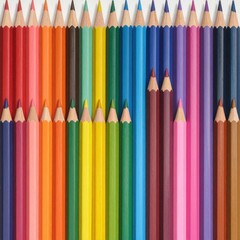 A grid of colorful pencils, arranged by hue, top row pointing up and bottom row down, creating a symmetrical rainbow effect