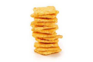 Stack of Crispy Golden Millet Crackers on White Background - Healthy Handmade Snack Food