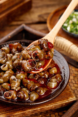 Spicy Braised Whelk Meat with Savory Sauce - Traditional Asian Seafood Dish