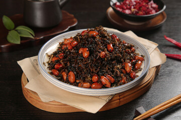 Stir Fried Preserved Vegetables with Peanuts Traditional Asian Dish in White Bowl on Wooden Serving Tray