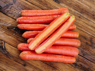 Fresh Orange Carrots on Rustic Wood Background - Healthy Organic Root Vegetables
